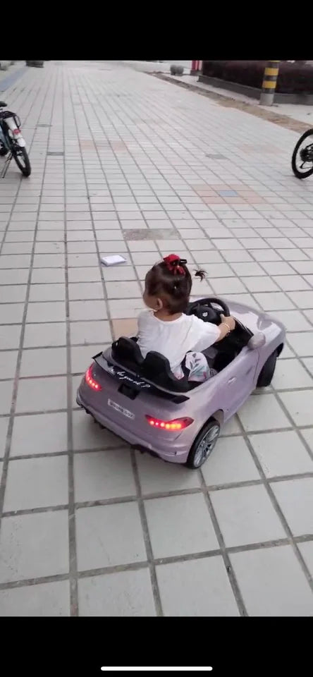 Kids Electric Ride-On Racing Car | Remote Control & Slow Start | Kids Rider