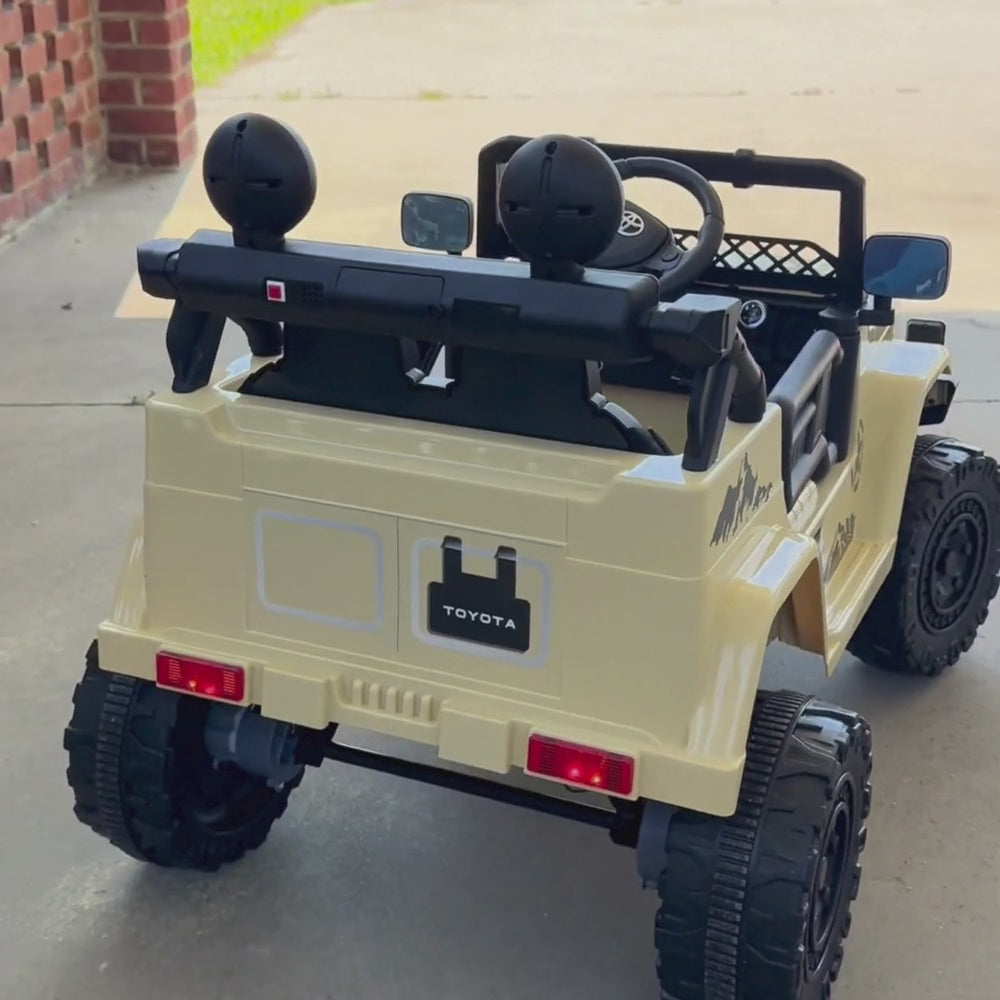 Vide showing Excited kids racing their Kids Rider Jeep down a suburban street.